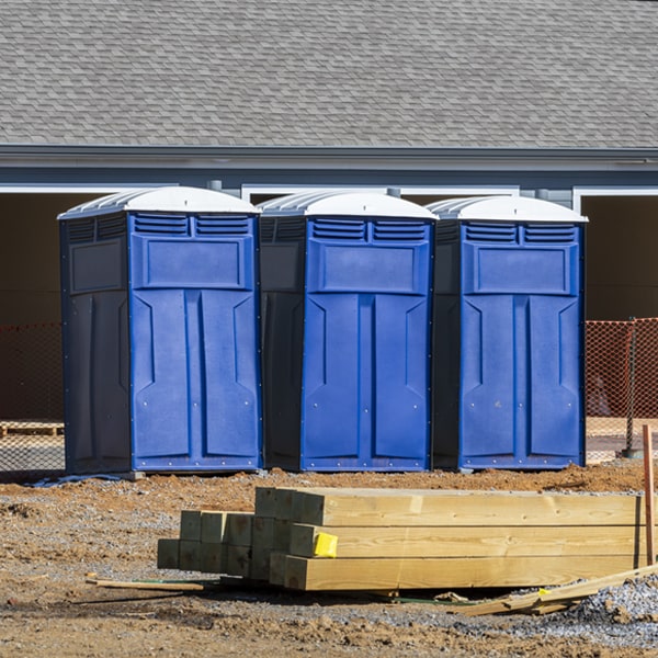 how often are the portable restrooms cleaned and serviced during a rental period in Melville